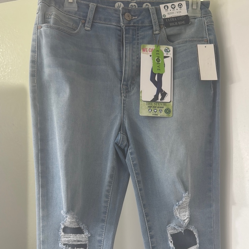 High Rise Light Blue Distressed Jeans
